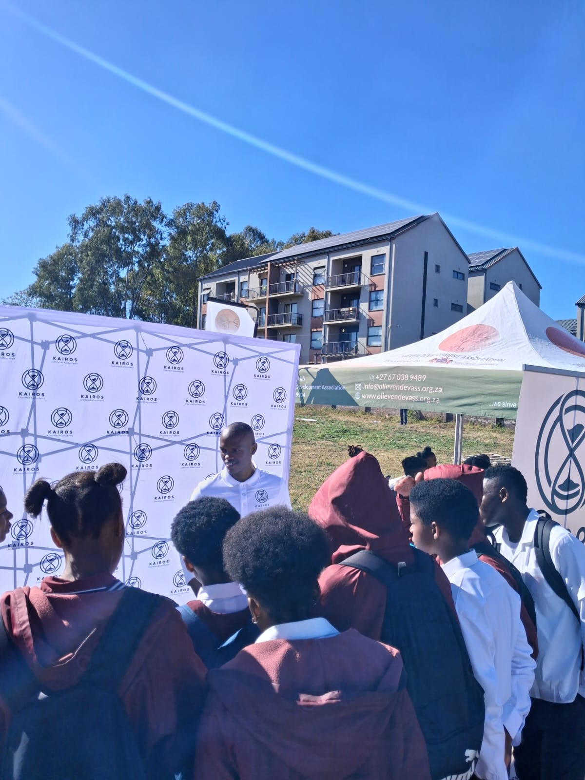 KAIROS team member speaking to learners at the KAIROS stand during Career Day 2026